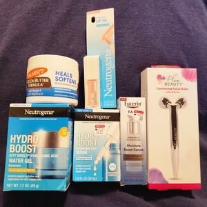 Lots Neutrogena Serum, Water Gel, Lip Oil, Eucerin Boost Serum & Face Roller